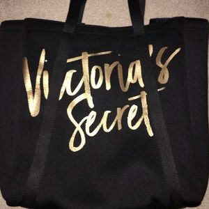 Victoria Secret Tote with cooler pockets inside.